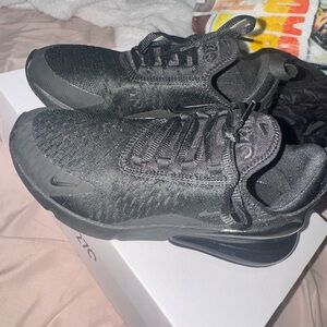 Nike Black Athletic Shoes with Breathable Fabric and Sleek Design